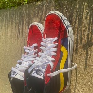 Red, Blue, Yellow, and black high top vans